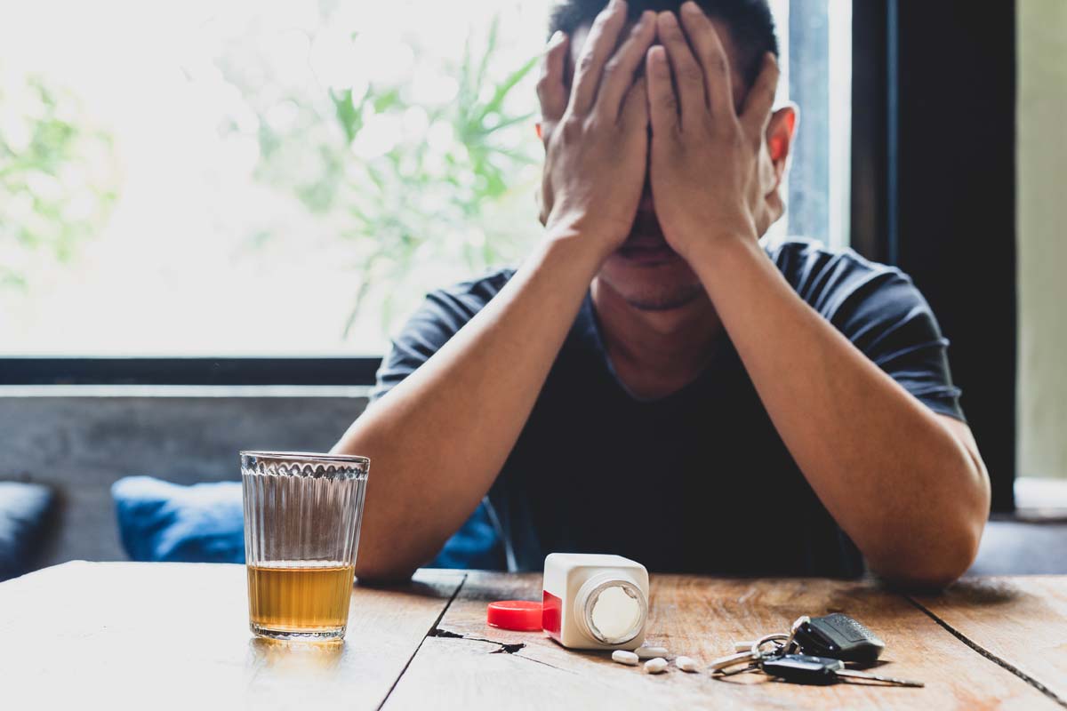 man thinking about drug overdose symptoms