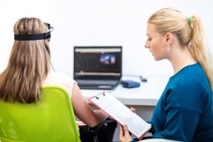 woman at a neurofeedback therapy program