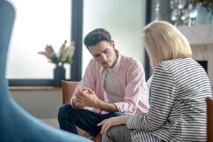 patient getting help at a cognitive-behavioral therapy program