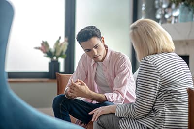 patient getting help at a cognitive-behavioral therapy program