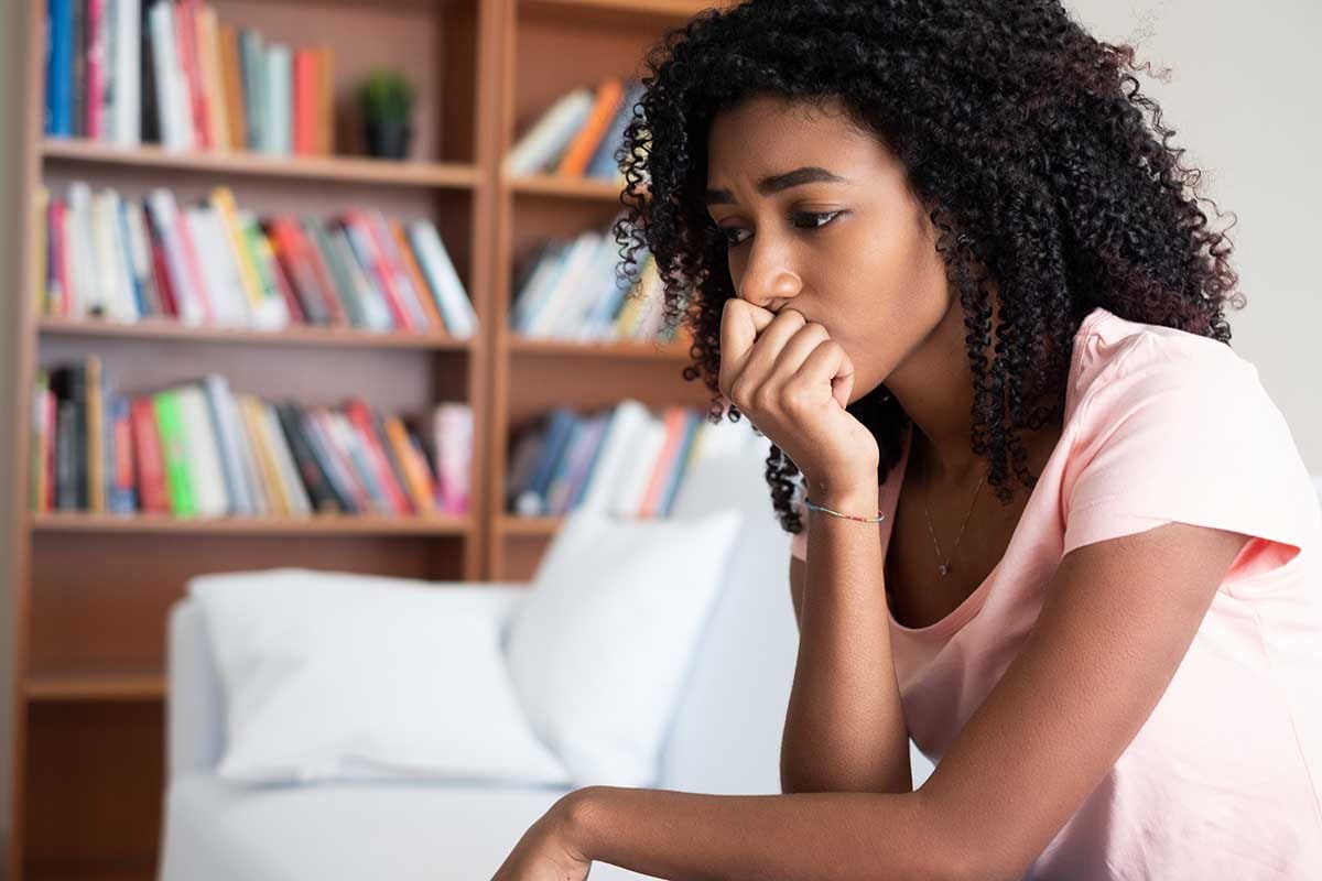 a woman considers oxycontin abuse and oxycontin rehab at an oxycontin addiction treatment center
