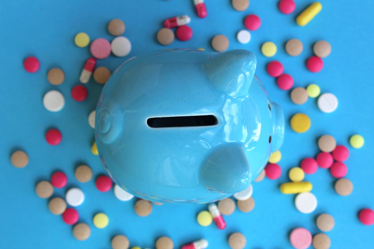 blue piggy bank for the cost of addiction treatment